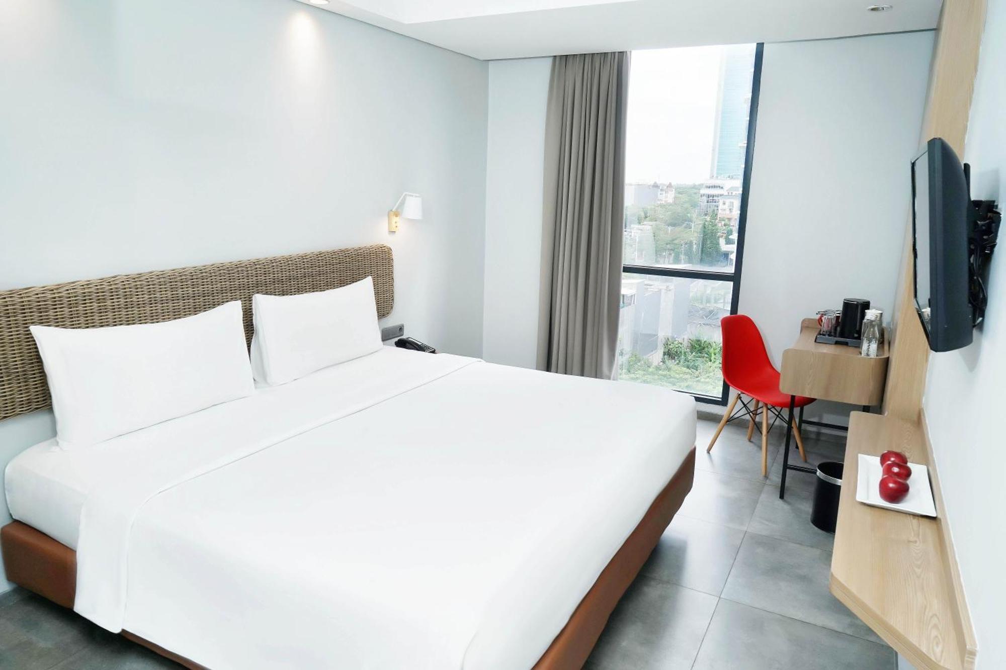 Neo Hotel Puri Indah Джакарта Экстерьер фото
