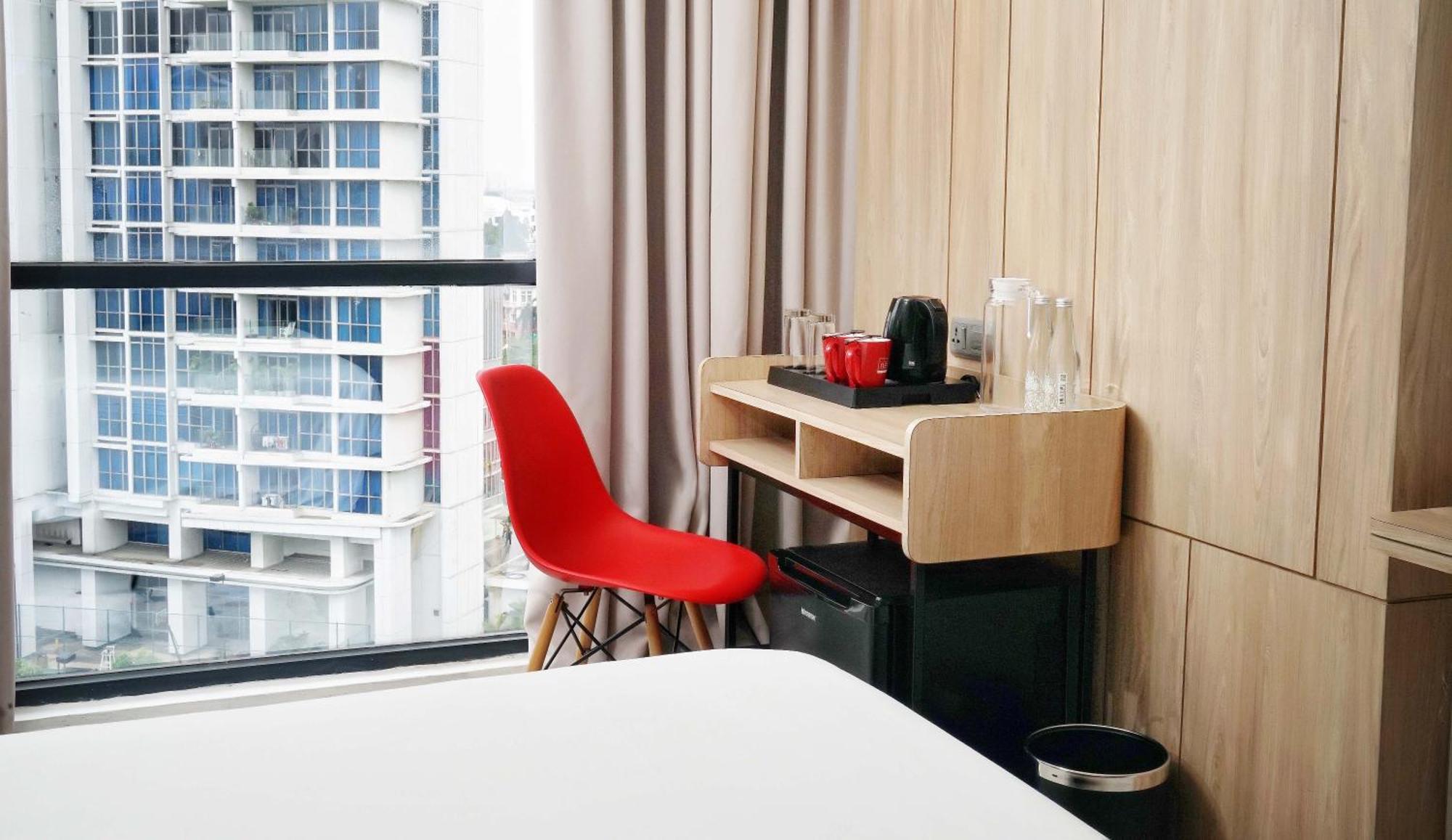 Neo Hotel Puri Indah Джакарта Экстерьер фото